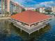 Unique waterfront clubhouse with a pyramid-shaped roof at 632 Edgewater Dr # 439, Dunedin, FL 34698