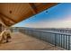 Covered waterfront deck with benches and water views at 632 Edgewater Dr # 439, Dunedin, FL 34698