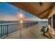 Relaxing waterfront deck with benches and sunset views at 632 Edgewater Dr # 439, Dunedin, FL 34698