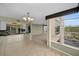 Open concept dining area with a view of the living room and kitchen at 632 Edgewater Dr # 439, Dunedin, FL 34698