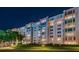 Night view of a multi-story condominium building at 632 Edgewater Dr # 439, Dunedin, FL 34698