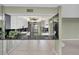 Modern kitchen with stainless steel appliances and a breakfast bar at 632 Edgewater Dr # 439, Dunedin, FL 34698
