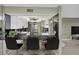 Modern kitchen with stainless steel appliances and a breakfast bar at 632 Edgewater Dr # 439, Dunedin, FL 34698