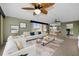 Living room with open floor plan and comfortable seating at 632 Edgewater Dr # 439, Dunedin, FL 34698