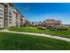Relaxing outdoor picnic area with a thatched roof and lush landscaping at 632 Edgewater Dr # 439, Dunedin, FL 34698