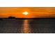 Stunning sunset over the water, reflecting vibrant colors on the surface at 632 Edgewater Dr # 439, Dunedin, FL 34698