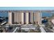 Aerial view of a high-rise building with water and city views at 7050 Sunset S Dr # 211, South Pasadena, FL 33707