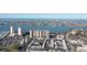Aerial view showing a high-rise building near the water at 7050 Sunset S Dr # 211, South Pasadena, FL 33707