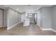 Modern kitchen with white cabinets and grey walls at 7050 Sunset S Dr # 211, South Pasadena, FL 33707