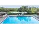 Relaxing community pool overlooking a peaceful canal at 7050 Sunset S Dr # 211, South Pasadena, FL 33707