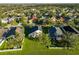 House nestled in a neighborhood with lake view at 8111 Tar Hollow Dr, Gibsonton, FL 33534