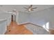 Bright bedroom with wood flooring and ceiling fan at 8111 Tar Hollow Dr, Gibsonton, FL 33534