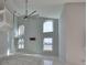 Open living area with vaulted ceilings and scenic waterfront views at 8111 Tar Hollow Dr, Gibsonton, FL 33534