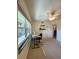 Home office in bright bedroom with window and ceiling fan at 9860 62Nd N Ter # 1013, St Petersburg, FL 33708
