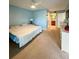 Large bedroom with a king-size bed and ensuite bathroom access at 9860 62Nd N Ter # 1013, St Petersburg, FL 33708