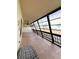 Enclosed patio with tiled floor and seating bench; water views at 9860 62Nd N Ter # 1013, St Petersburg, FL 33708