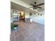 Enclosed patio with table, chairs and view of living room at 9860 62Nd N Ter # 1013, St Petersburg, FL 33708