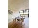 Enclosed patio with table and chairs and water views at 9860 62Nd N Ter # 1013, St Petersburg, FL 33708