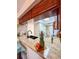 Kitchen with granite countertops and breakfast bar at 9860 62Nd N Ter # 1013, St Petersburg, FL 33708