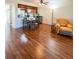 Living room features hardwood floors and neutral color palette at 9860 62Nd N Ter # 1013, St Petersburg, FL 33708