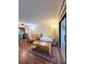 Living room with hardwood floors and access to patio at 9860 62Nd N Ter # 1013, St Petersburg, FL 33708