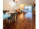 Spacious living area with hardwood floors and open concept at 9860 62Nd N Ter # 1013, St Petersburg, FL 33708