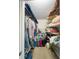 Large walk-in closet with wire shelving, providing ample storage space at 9860 62Nd N Ter # 1013, St Petersburg, FL 33708