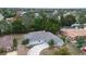 Single-story home with driveway and neighborhood view at 10237 Carrin Rd, Spring Hill, FL 34608