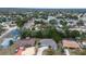 An aerial view of a residential neighborhood showing the location of the property at 10237 Carrin Rd, Spring Hill, FL 34608
