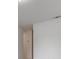 Simple hallway with white walls and doors at 10237 Carrin Rd, Spring Hill, FL 34608