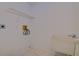 Laundry room with utility sink and shelving at 10237 Carrin Rd, Spring Hill, FL 34608