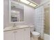 Bathroom with white vanity, toilet and tub shower at 11511 113Th St # 13H, Largo, FL 33778