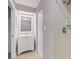 Clean bathroom with vanity, shower and tiled walls at 11511 113Th St # 13H, Largo, FL 33778