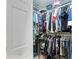 Large reach-in closet with double hanging rods and shelving at 11511 113Th St # 13H, Largo, FL 33778