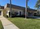 Deerwood Gardens community clubhouse exterior view at 11511 113Th St # 13H, Largo, FL 33778