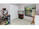 Craft room with 3D printer, storage bins, and work space at 11511 113Th St # 13H, Largo, FL 33778