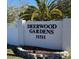 Deerwood Gardens community entrance sign at 11511 113Th St # 13H, Largo, FL 33778