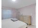 Serene main bedroom with a large dresser and plenty of natural light at 11511 113Th St # 13H, Largo, FL 33778