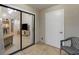 Bright screened patio with view of lush trees and water at 11511 113Th St # 13H, Largo, FL 33778
