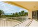 Spacious balcony overlooking the ocean and lush landscaping at 1200 Gulf Blvd # 204, Clearwater Beach, FL 33767