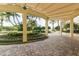 Circular driveway entrance with lush landscaping and covered walkway at 1200 Gulf Blvd # 204, Clearwater Beach, FL 33767