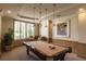 Game room boasts a billiard table and comfortable seating at 1200 Gulf Blvd # 204, Clearwater Beach, FL 33767