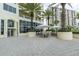 Outdoor patio area with tables and umbrellas at 1200 Gulf Blvd # 204, Clearwater Beach, FL 33767