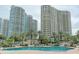 Expansive pool with surrounding condo buildings at 1200 Gulf Blvd # 204, Clearwater Beach, FL 33767