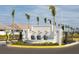 Community entrance with water feature and gated access at 12269 New Tranquility Path, Venice, FL 34293