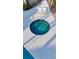 Relaxing community hot tub with two lounge chairs at 1604 Boswell Ln, New Port Richey, FL 34655