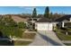Attractive two-car garage home with landscaped front yard at 1604 Boswell Ln, New Port Richey, FL 34655