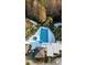 Community pool and spa with surrounding lounge chairs at 1604 Boswell Ln, New Port Richey, FL 34655