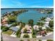 Waterfront property with boat dock and lush landscaping at 16301 Redington Dr, Redington Beach, FL 33708