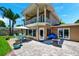 Patio area with outdoor furniture and a grill at 16301 Redington Dr, Redington Beach, FL 33708